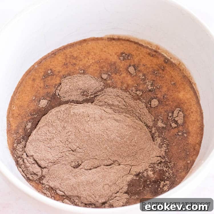 chocolate pudding mix and milk in bowl