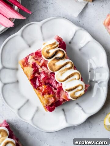 Lemon rhubarb bar on a white plate.