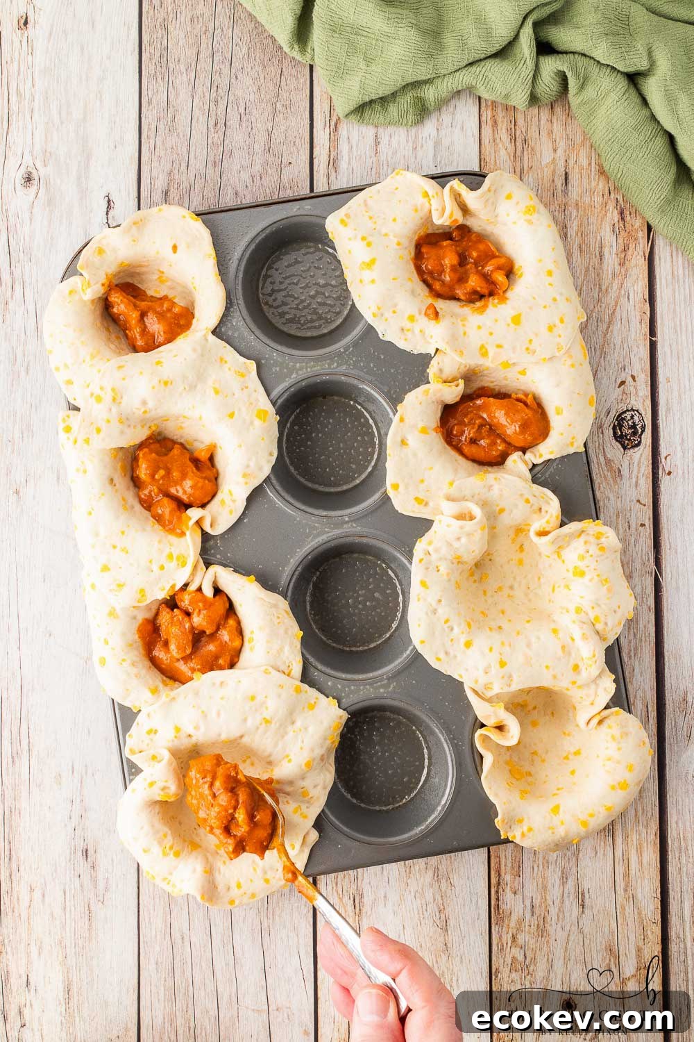Add chili to the muffin tin