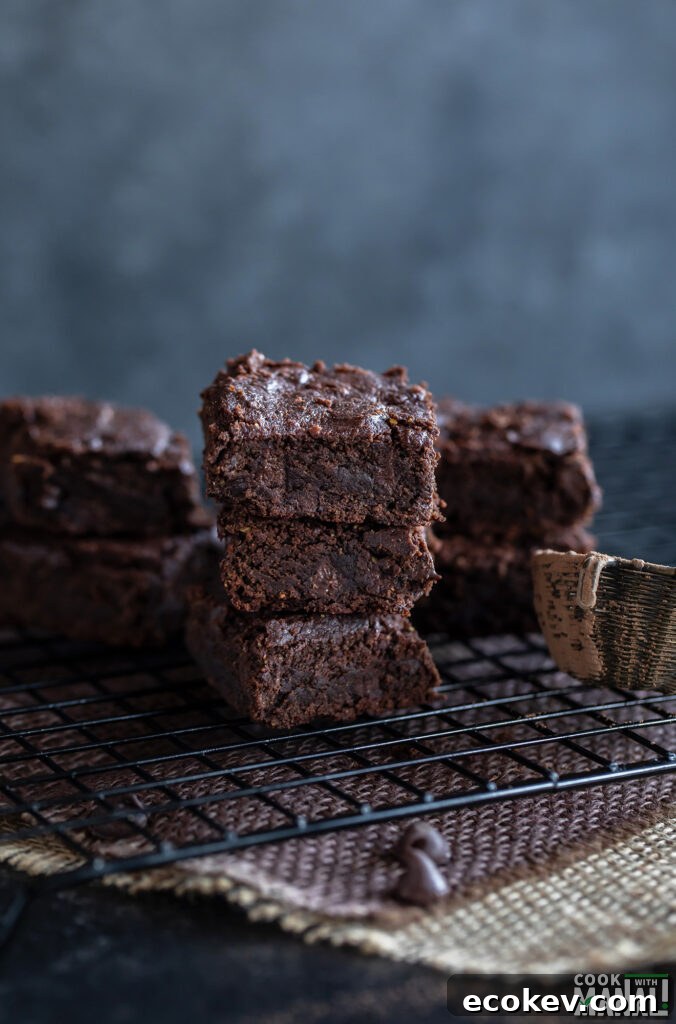 Eggless Besan (Chickpea Flour) Brownies Recipe 2 3 brownies stacked on top of each other