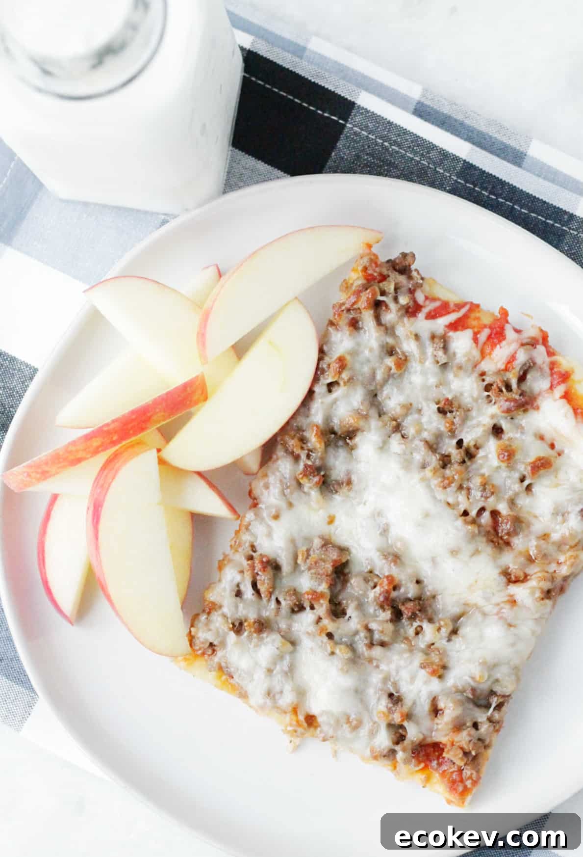 overhead view of a slice of school lunch pizza