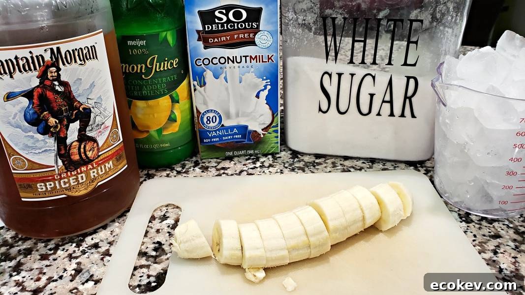 captain morgan spiced rum, lime juice, coconut milk, white sugar, ice cubes, and sliced banana.