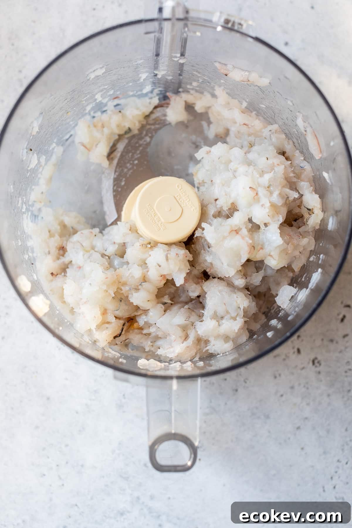 shrimp added to a food processor and blended