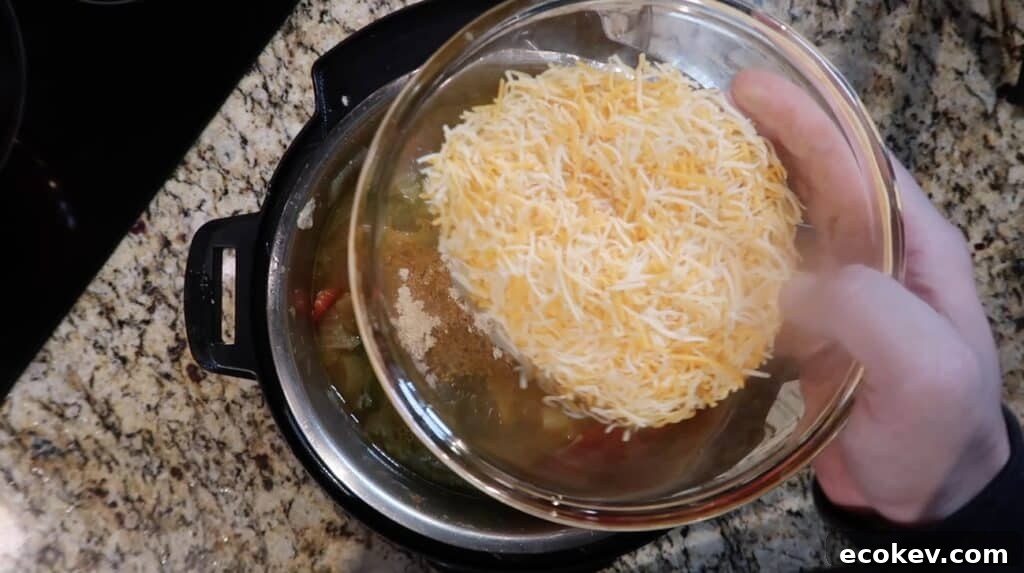 Adding cheese to pot