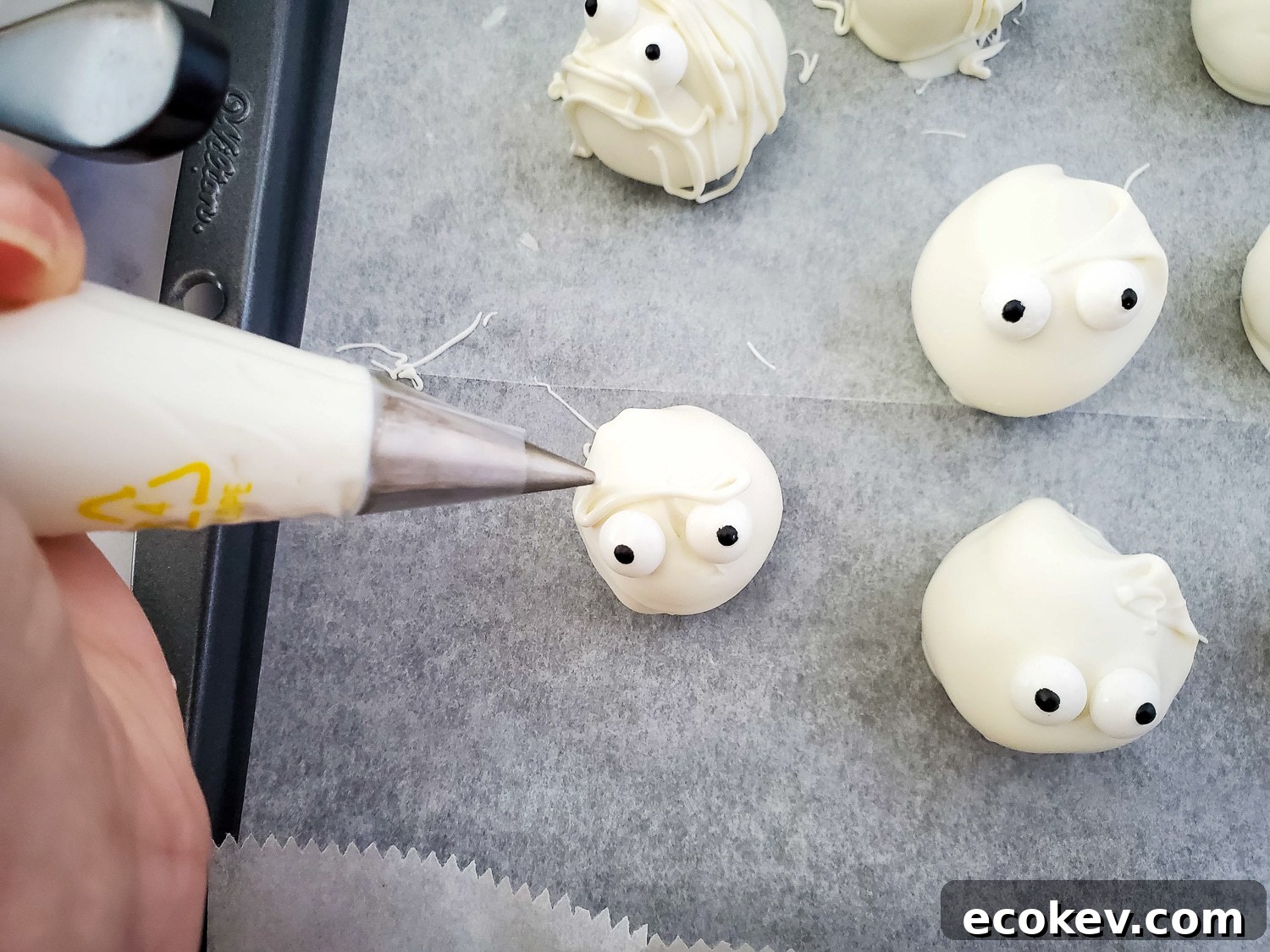 dipping oreo balls in white coating
