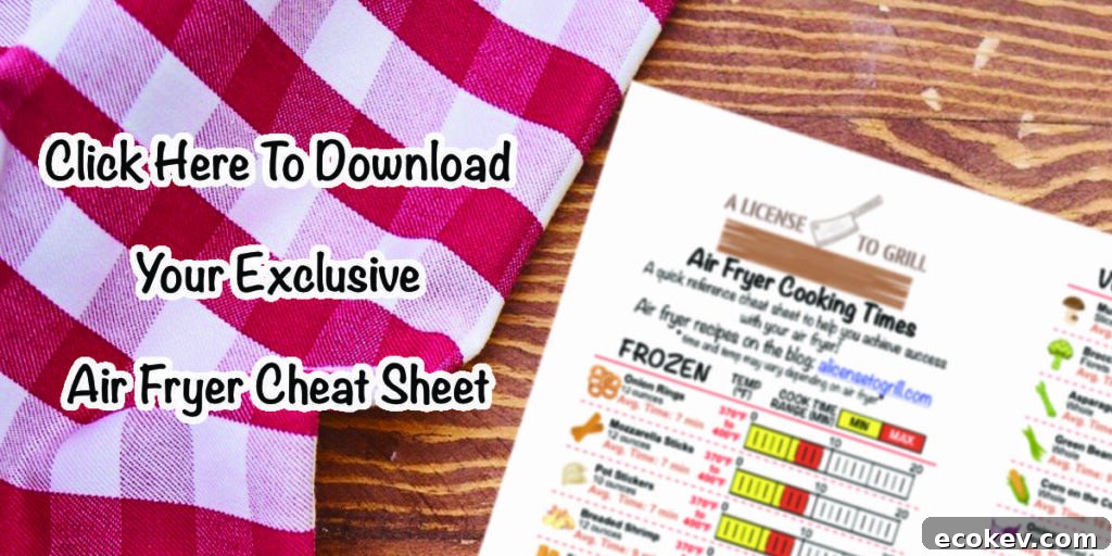 air fryer cheat sheet preview sitting on wood desk with text "click here to download your exclusive air fryer cheat sheet"
