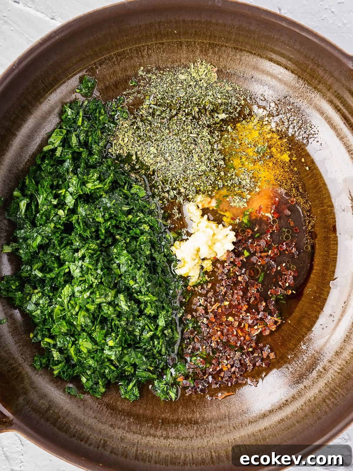 Ingredients getting mixed in a bowl.